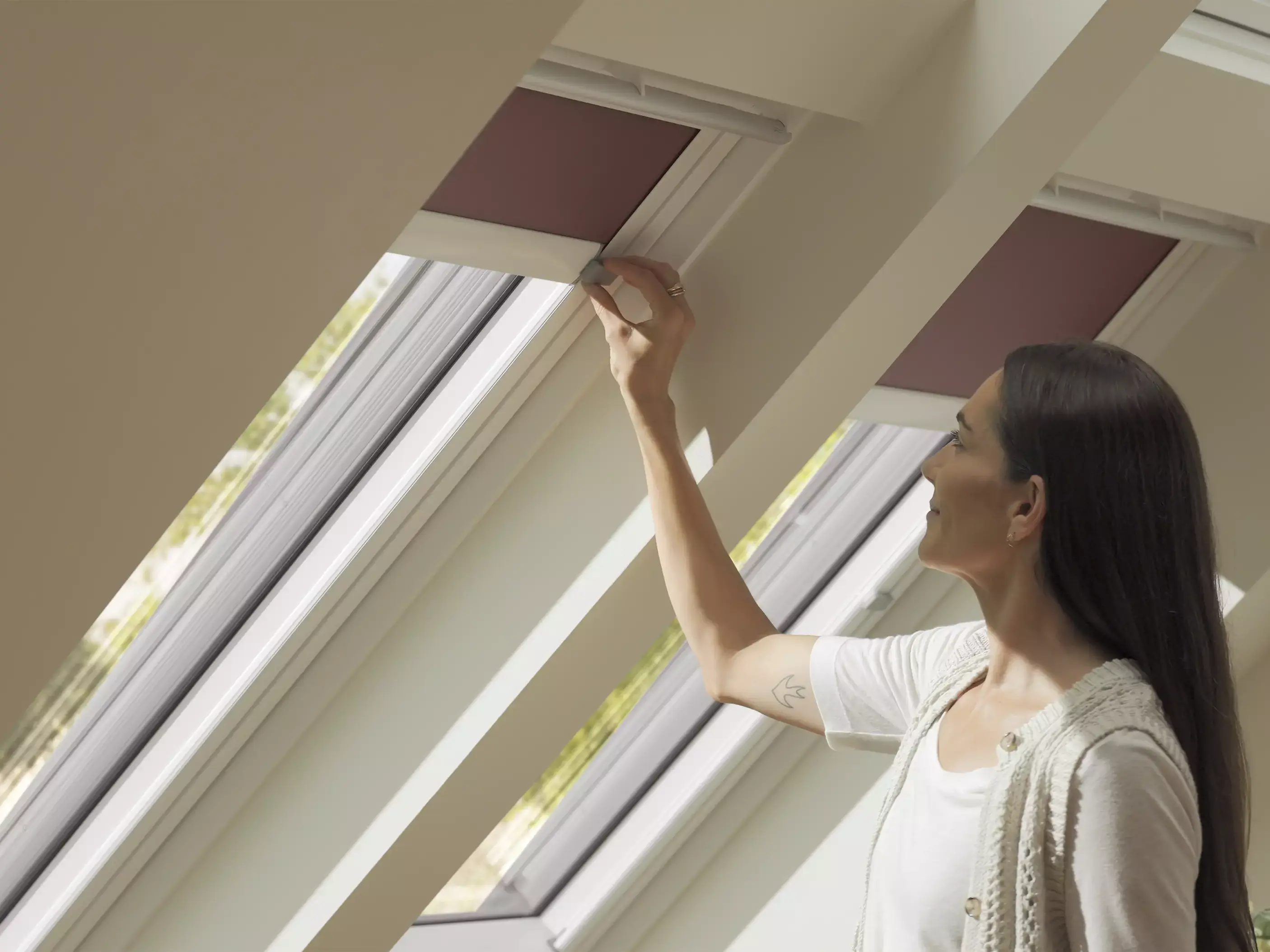 Manual operation of blinds with slider